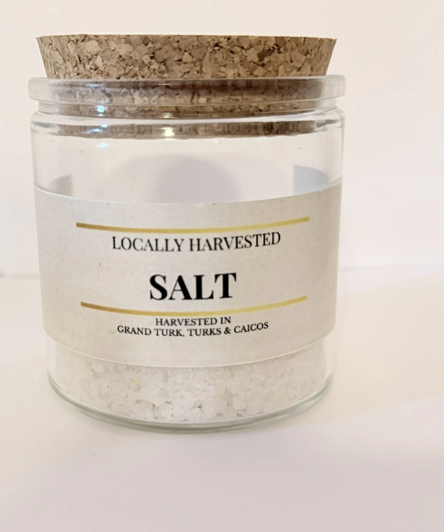 Locally harvested island salt in a Mystique Atelier Circle glass jar